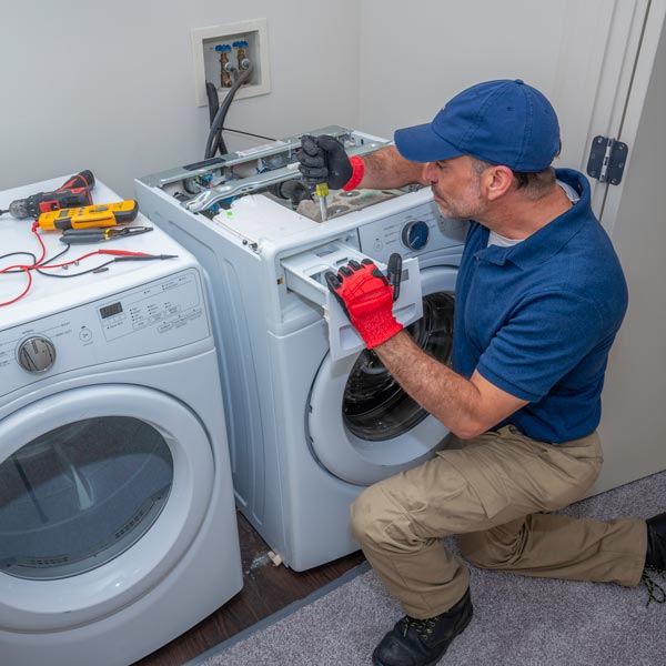 Washing Machine Repair Experts fixing a broken washer in Salt Lake County, UT